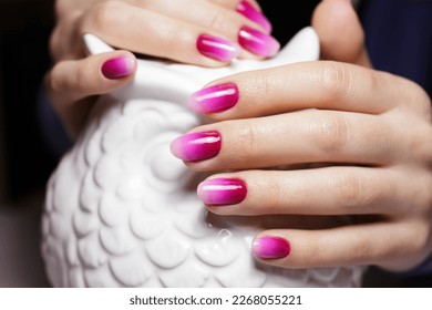 Women's hands and gradient pink manicure  Nail design  manicure and gel polish