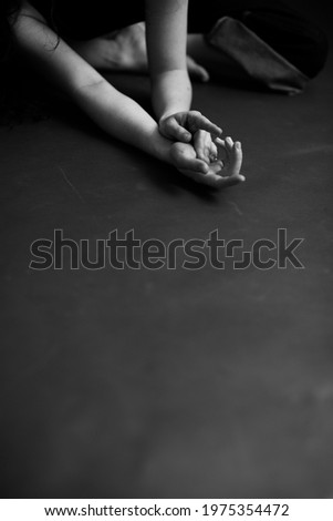 Similar – Image, Stock Photo Squatting female person from behind. The back is free, the waist is covered by a kidney warmer