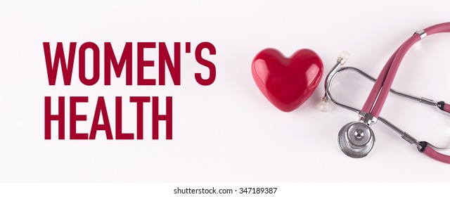 WOMEN'S HEALTH concept with stethoscope and heart shape