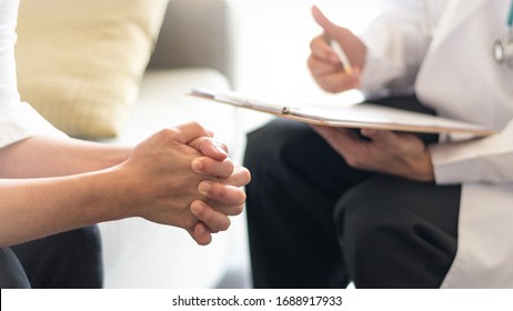 Women's Health healthcare concept. Obstetricians consulting female patient on Obstetrics and Gynecology diseases.Professional psychologist doctor consult in psychotherapy session or counsel diagnosis  - Powered by Shutterstock