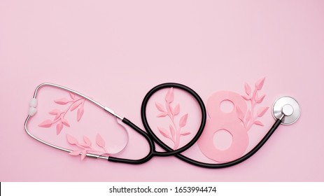 Women's Health, Medicine And Healthcare Concept. Pink Background With Medical Stethoscope And Paper Flowers. Copy Space. World Women's Day, March 8th