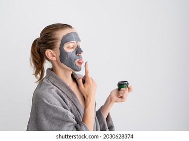 Womens Health. Spa And Wellness. Happy Funny Woman Applying Face Mask And Tasting It