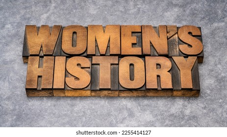 women's history - word abstract in vintage letterpress wood type, contributions of women to events in history and contemporary society