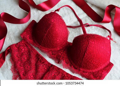 Women's lace sexy underwear of red, wine color: bra and panties.