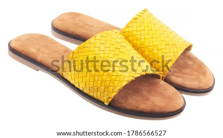 Women's leather beach slippers isolated on white