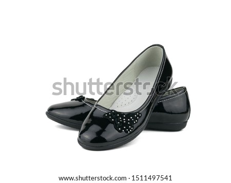 Women's leather flats isolated on white background. Stylish and fashionable women's shoes.