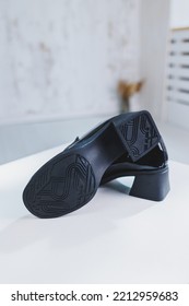 Women's Leather Shoes With A Massive Heel. Black Autumn Shoes For Women On A White Background.