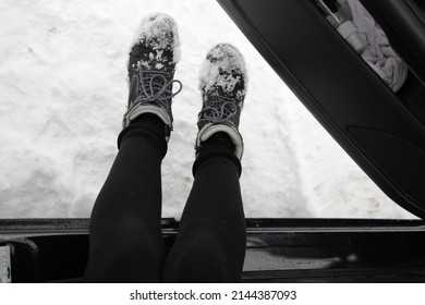 Women's Legs Shake Off Snow Boots When Boarding A Car POV View