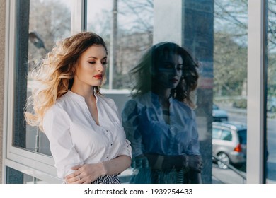 Womens Mental Health. Anxiety Panic Disorders. Bipolar Disorder. Outdoor Portrait Of Young Sad Woman And Her Dark Reflection In The Mirror Window