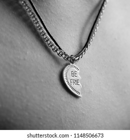 Women`s Necklace In The Shape Of A Broken Heart. Friendship