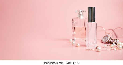 Womens Perfume In Glass Tube, On Pink Background, Copy Space, Banner