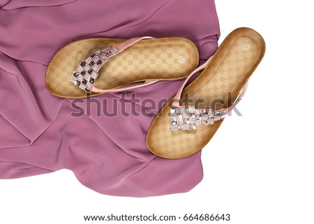 Women's pink sandals on a white background closeup