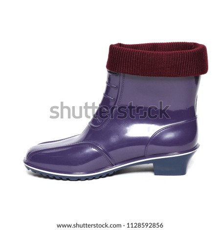 Women's rain boots isolated on white background
