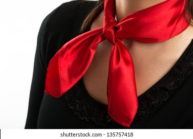 Women's shirt with red scarf isolated on white