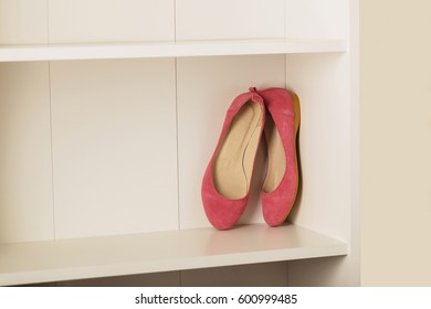 Womens Shoes (flats) On The Shelf In The Closet. Selective Focus