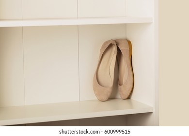 Womens Shoes (flats) On The Shelf In The Closet. Selective Focus