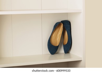 Womens Shoes (flats) On The Shelf In The Closet. Selective Focus