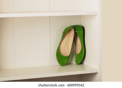 Womens Shoes (flats) On The Shelf In The Closet. Selective Focus.