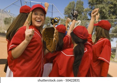 Women's Softball Team Celebrating