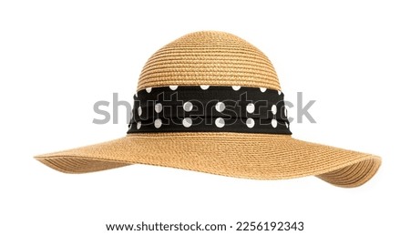 Womens straw hat with a ribbon on a white background.