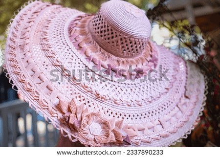 Womens summer pink straw hat with ribbon and woven flower. Vintage Panama hat, Womens summer purple straw hat. Nobody, close up, top view