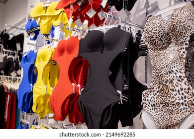 Women's swimsuit in the store. Fashionable swimsuits are continuous.