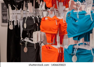 Women's swimsuits for sale at a seaside shop. Advertise, Sale, Fashion concept.