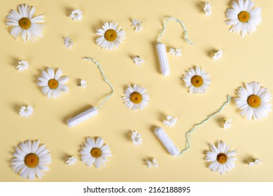 Women's Tampons And Bloom Chamomile Pattern On A Beige Pastel Background. Idea Women's Health Tenderness Flat Ley
