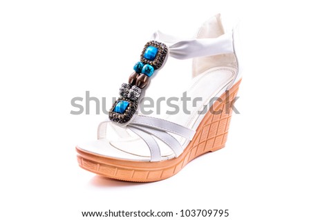Women's white summer sandals with rhinestones. Isolated on white background