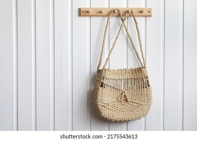 Women's Wicker Bag Hangs On A Hanger.