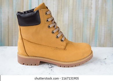 Women's winter boots. Yellow warm boots for trekking. - Shutterstock ID 1167131905