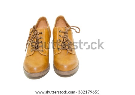 Women's yellow fashion boots on a white background