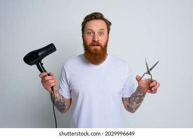 Wondered Man With Hair Straightener Is Ready To Work