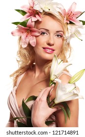 Wonderful blonde lady with wreath from flowers on head