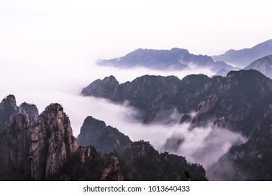 Wonderful and curious sea of clouds at beautiful mountain landscape.