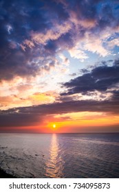 Wonderful dusk over calm ocean in summer - Shutterstock ID 734095873