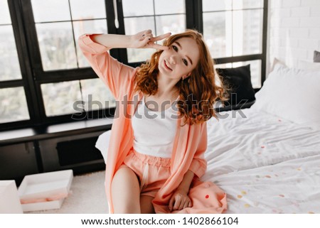 Similar – happy child girl playing at home in cozy weekend morning