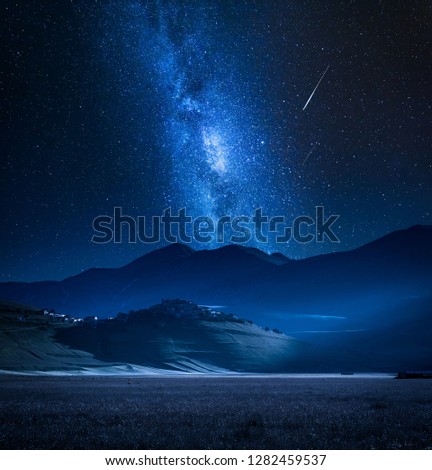 Wonderful milky way over Castelluccio at night, Umbria, Italy, Europe