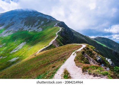 Wonderful mountain landscape. Mountains ridge illuminated by sun. Most beautiful hiking trail in Tatras, border Poland, Slovakia. Top (Starobocianski Wierch or Klin). Climbing and adventure.