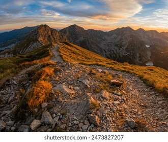 Wonderful mountains with a hiking trail on the ridge. Picturesque places in Tatra Mountains in Poland. View on mountain ridge (Volovec Wolowiec) in Western Tatras.  - Powered by Shutterstock