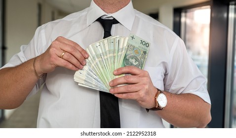 A Wonderful Refined Man Holds Polish Zlotys In His Strong Hands. The Concept Of High Income