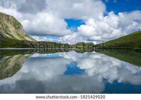 Wonderful reflections on Lake Zürs at the Arlberg, Austria