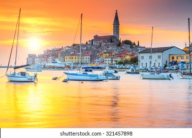 Wonderful romantic old town of Rovinj and famous fishing harbor with magical sunset,Istrian Peninsula,Croatia,Europe
