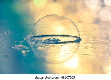 Wonderful Single Soap Bubble On Shimmering Background