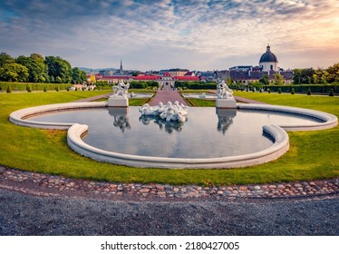 Wonderful summer scene of Belvedere park, built by Johann Lukas von Hildebrandt for Prince Eugene of Savoy. Spectacular sunrise in Vienna, Austria, Europe. Traveling concept background.
