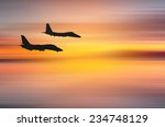 Wonderful sunset over Santa Monica,California with two fighter jets. Abstract piece of art with motion blur