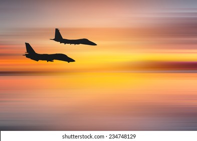 Wonderful Sunset Over Santa Monica,California With Two Fighter Jets. Abstract Piece Of Art With Motion Blur