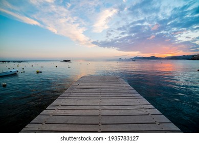 Wonderful sunset from a pier in Calabardina, Aguilas, Spain