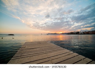 Wonderful sunset from a pier in Calabardina, Aguilas, Spain - Powered by Shutterstock