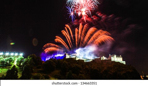 Wonderful View Of Edinburgh Castle At Night With Fireworks.